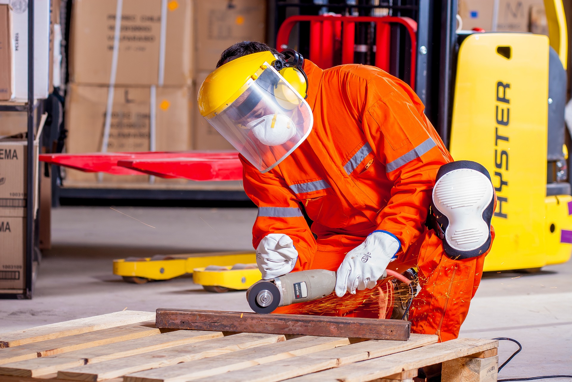 Industrial worker building packaging products.